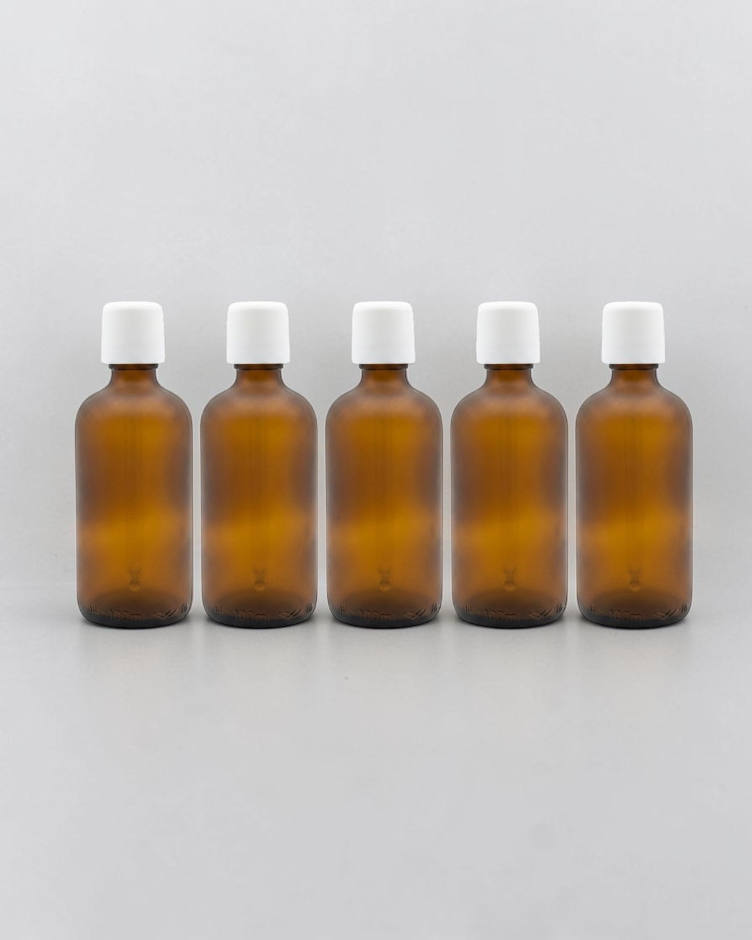 Amber Glass Bottles with White Cap